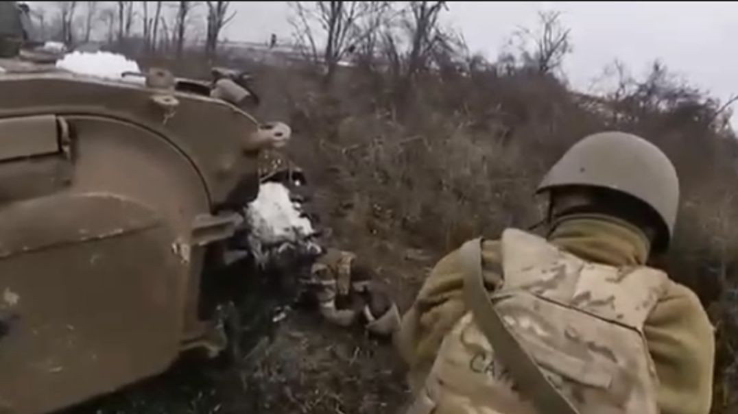 Close combat battle : Ukrainian soldiers  take over Russian position  with support of BMP-1 armored